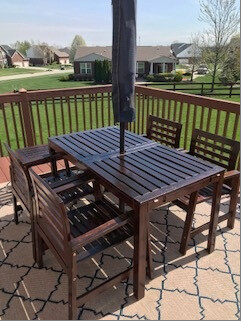 Furnished deck with table and chairs