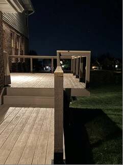 Deck railing frame and stairs at night