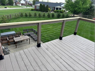 Deck railing with horizontal wire installed